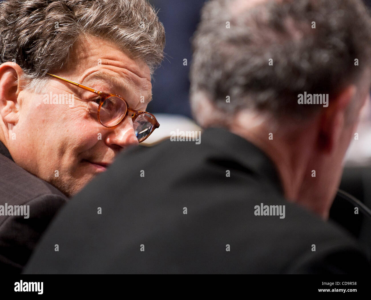 Jul 20, 2010 - Washington, District of Columbia, U.S., - Senator AL FRANKEN (D-MN) confers with Senator Kaufman before the start of the Senate Judiciary Committee meeting on Tuesday. The committee voted, 13-6, in favor of Solicitor General KaganÃ•s confirmation to the Supreme Court. The vote was lar Stock Photo