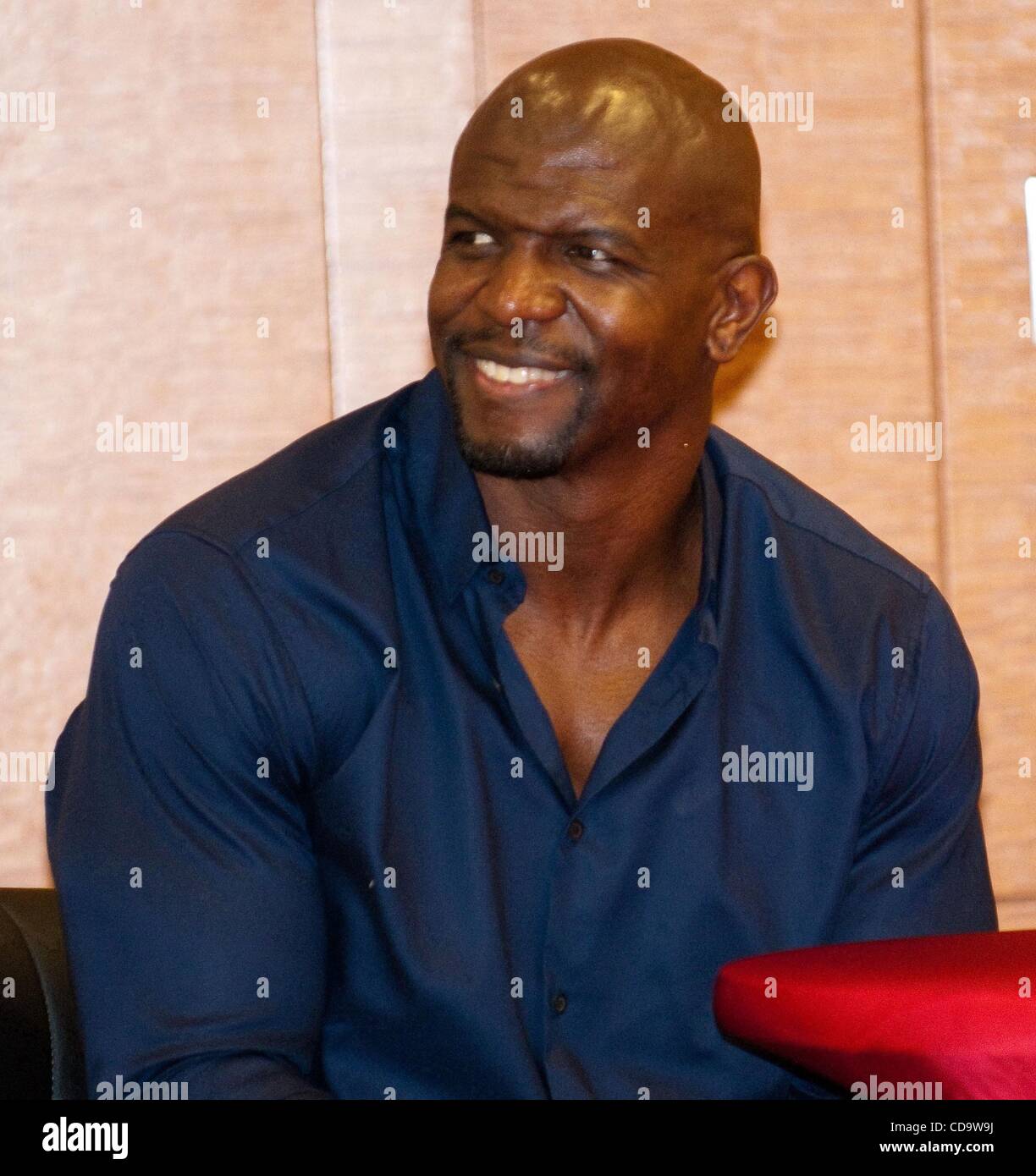 Jul 24, 2010 - Philadelphia, Pennsylvania, U.S. - Actor and Reality TV  Star, TERRY CREWS and wife, REBECCA CREWS, greet the crowd as he gives a  speech to the youth at a