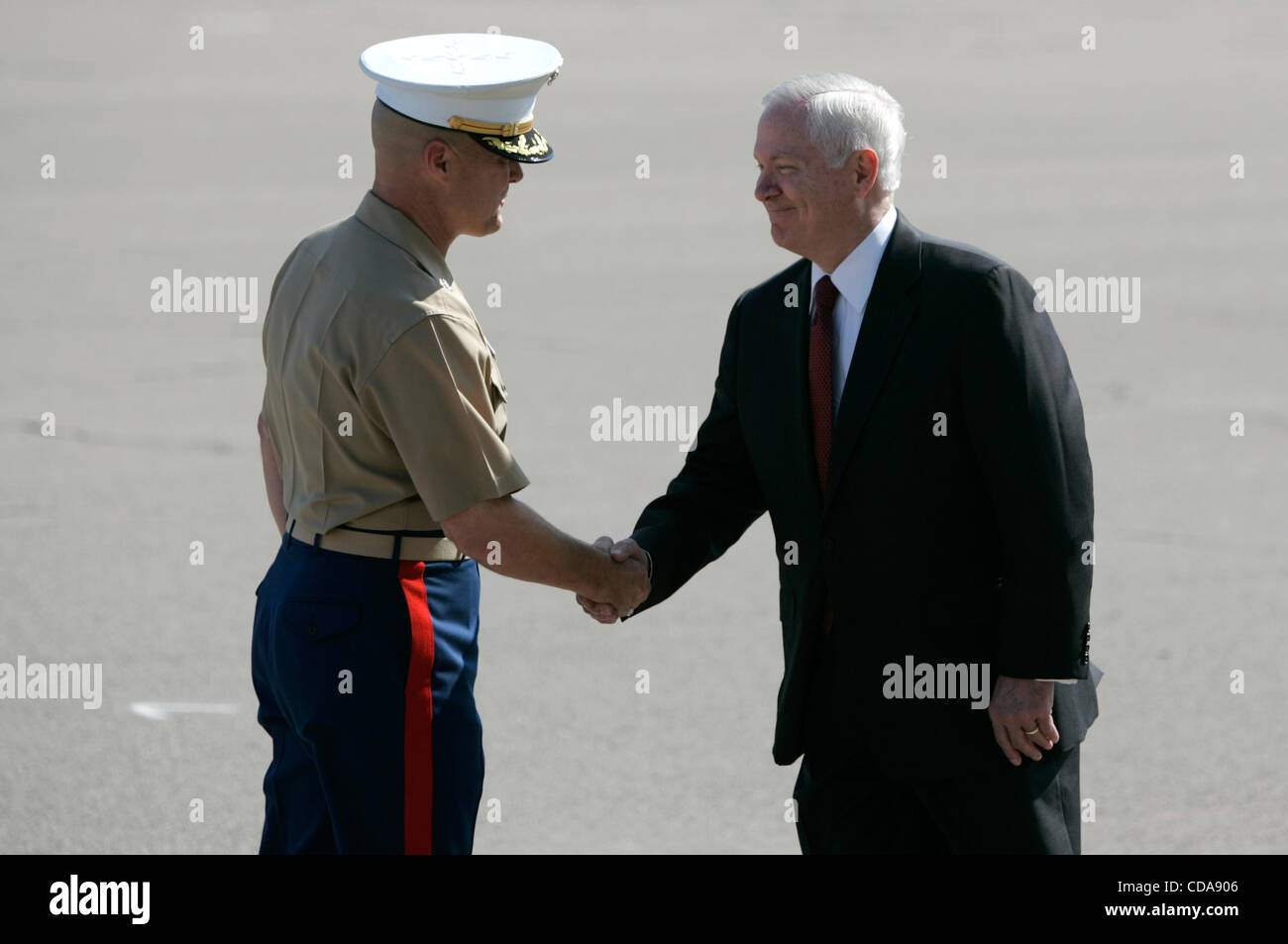 Aug. 13, 2010 - San Diego, California, USA - Friday August, 13th 2010- Marine Corps Recruit Depot, San Diego, CA USA- Secretary of Defense Robert Gates shakes hands with LT. COL. Thomas McCann following an award ceremony for the top Marines following a Basic Marine Graduation Ceremony. Gates also vi Stock Photo