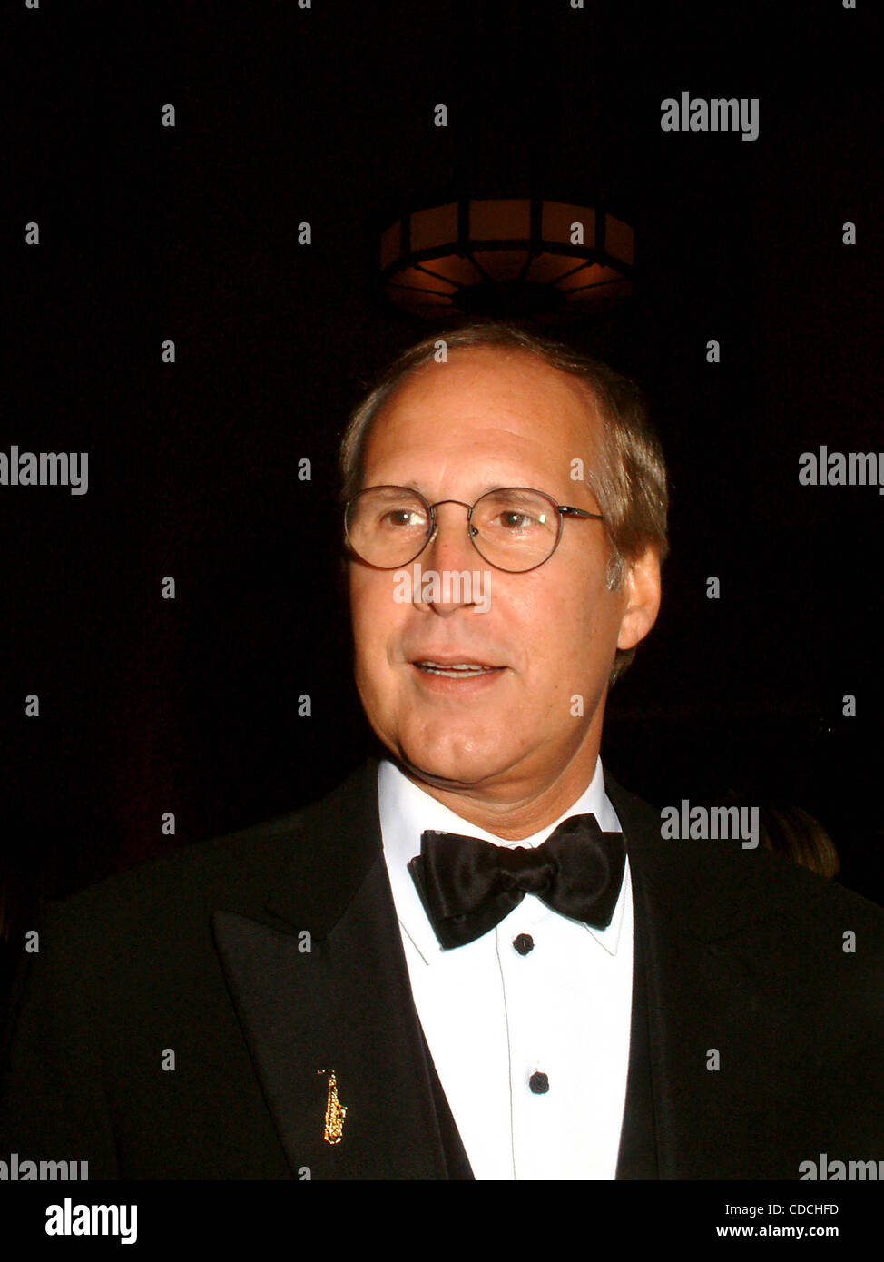 CHEVY CHASE.K30341ML.THE FIRST ANNUAL APPLE CARES GALA TO BENEFIT THE APPLECARE FOUNDATION AT CIPRIANI'S IN NEW YORK New York.4/30/2003.  /    2003(Credit Image: Â© Mitchell Levy/Globe Photos/ZUMAPRESS.com) Stock Photo