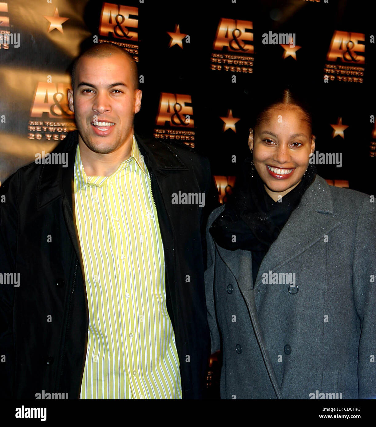 K35169ML.A & E TELEVISION NETWORKS CELEBRATES ITS 20TH ANNIVERSARY AT THE MANDARIN ORIENTAL HOTEL IN NEW YORK New York.1/27/20004.  /    2004.COBY BELL AND WIFE(Credit Image: Â© Mitchell Levy/Globe Photos/ZUMAPRESS.com) Stock Photo