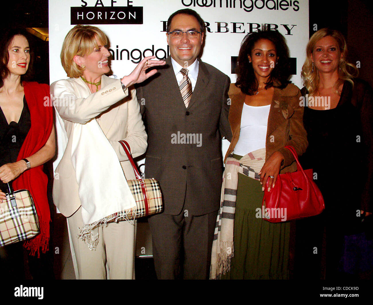 DAYLE HADDON, FELICIA TAYLOR, MALAAK COMPTON ROCK AND CYNTHIA LUFKIN.K32542ML.BLOOMINGDALE'S OPENS BURBERRY ACCESSORY SHOP WITH OPENING RECEPTION TO BENEFIT SAFE HORIZON AT BLOOMINGDALE'S IN NEW YORK New York.9/4/2003.  /    2003(Credit Image: Â© Mitchell Levy/Globe Photos/ZUMAPRESS.com) Stock Photo
