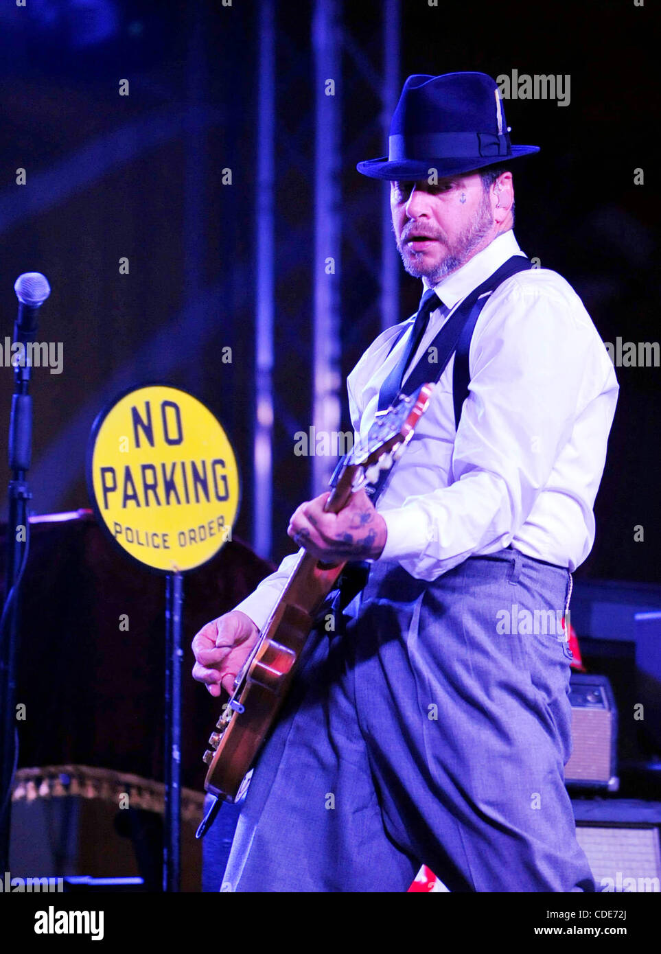 Jan. 24, 2011 - Bakersfield, California - U.S.  - Social Distortion led by MIKE NESS perform at the Kern County Fairgrounds Monday. Performing with Ness are JONNY WICKERSHAM on guiter, bassist BRETT HARDING and DAVE HIDALGO JR on drums. (Credit Image: Alan Greth/ZUMAPress.com) Stock Photo