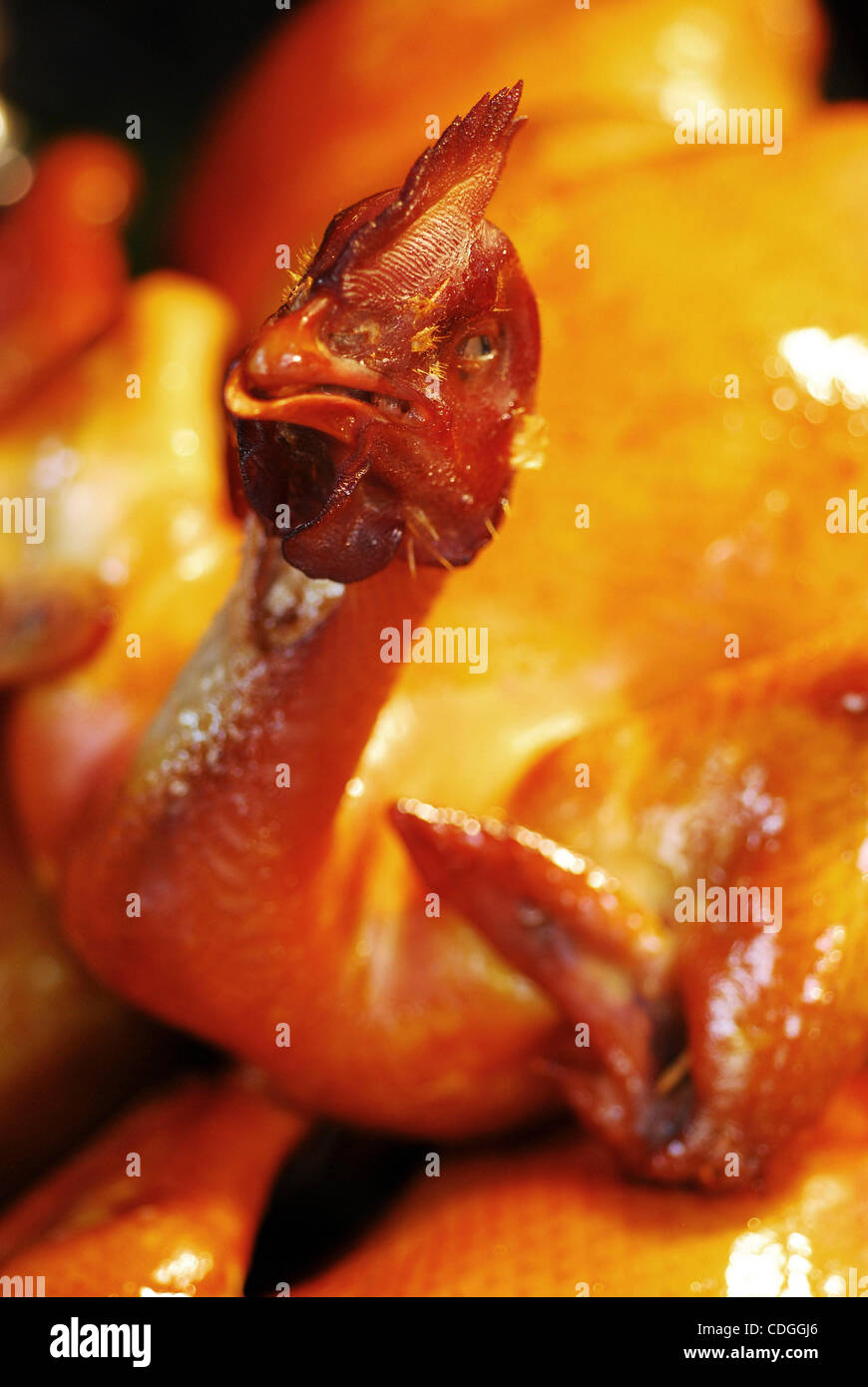 Dec 12, 2007 - Taoyuan City, Taiwan - Troughs of whole fried chickens, face and all, are fairly common at Taiwan's night markets such as this one in Taoyuan City. (Credit Image: © Josh Edelson/ZUMAPRESS.com) Stock Photo