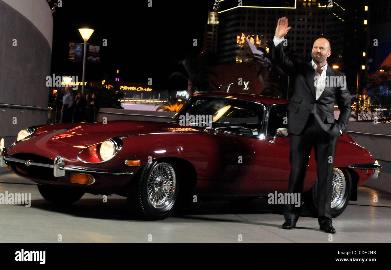 Jan 26, 2011 - Las Vegas, Nevada, USA -Actor JASON STATHAM appears next to a 1970 E-Type Series 2 Jaguar coupe as he arrives for a screening of 'The Mechanic' at the Planet Hollywood Resort & Casino January 26, 2011 in Las Vegas, Nevada.  The film opens nationwide January 28. (Credit Image: &#194;& Stock Photo