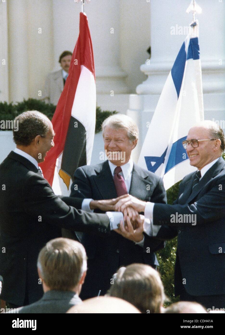 Jan. 27, 2011 - Washington, DISTRICT OF COLUMBIA, U.S. - (FILE) A file picture dated 26 March 1979 shows US President Jimmy Carter (C) with Israeli Prime Minister Menachem Begin (R) and Egyptian President Anwar al Sadat during the signing ceremony for a peace agreement between Egypt and Israel at th Stock Photo