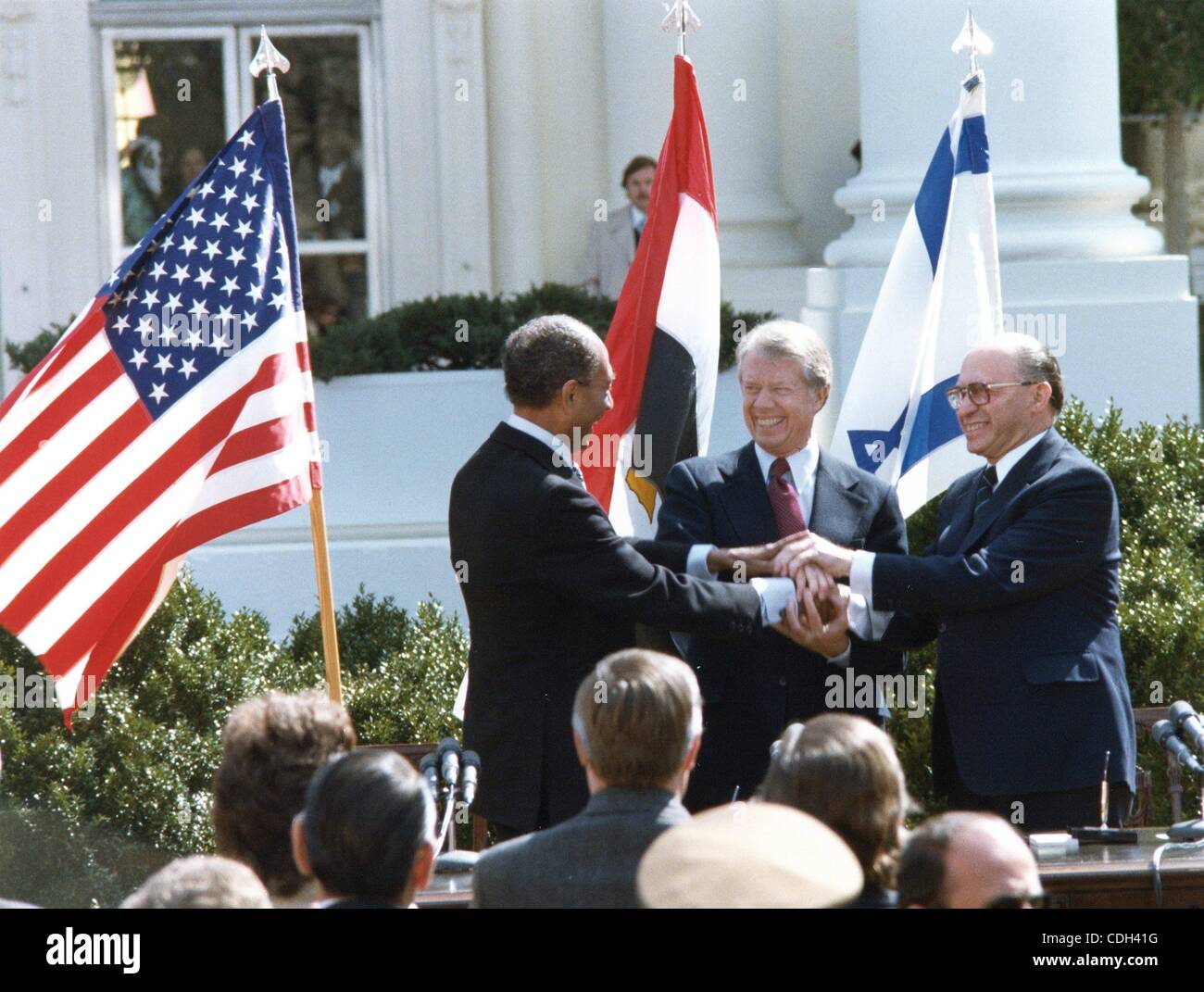 Jan. 27, 2011 - Washington, DISTRICT OF COLUMBIA, U.S. - (FILE) A file picture dated 26 March 1979 shows US President Jimmy Carter (C) with Israeli Prime Minister Menachem Begin (R) and Egyptian President Anwar al Sadat during the signing ceremony for a peace agreement between Egypt and Israel at th Stock Photo