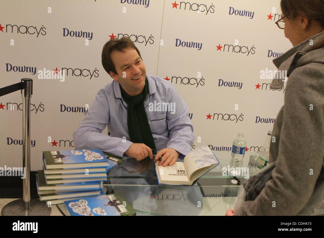 Feb 01, 2011 - New York, New York, U.S. - Comedian MIKE BIRBIGLIA sings his book 'Sleep Walk with Me' after living a week in a Macy's window display during 'Clean Sheet Week', a promotion for Downy fabric softener and Macy's at their Herald Square store in Manhattan. (Credit Image: © Mariela Lombard Stock Photo