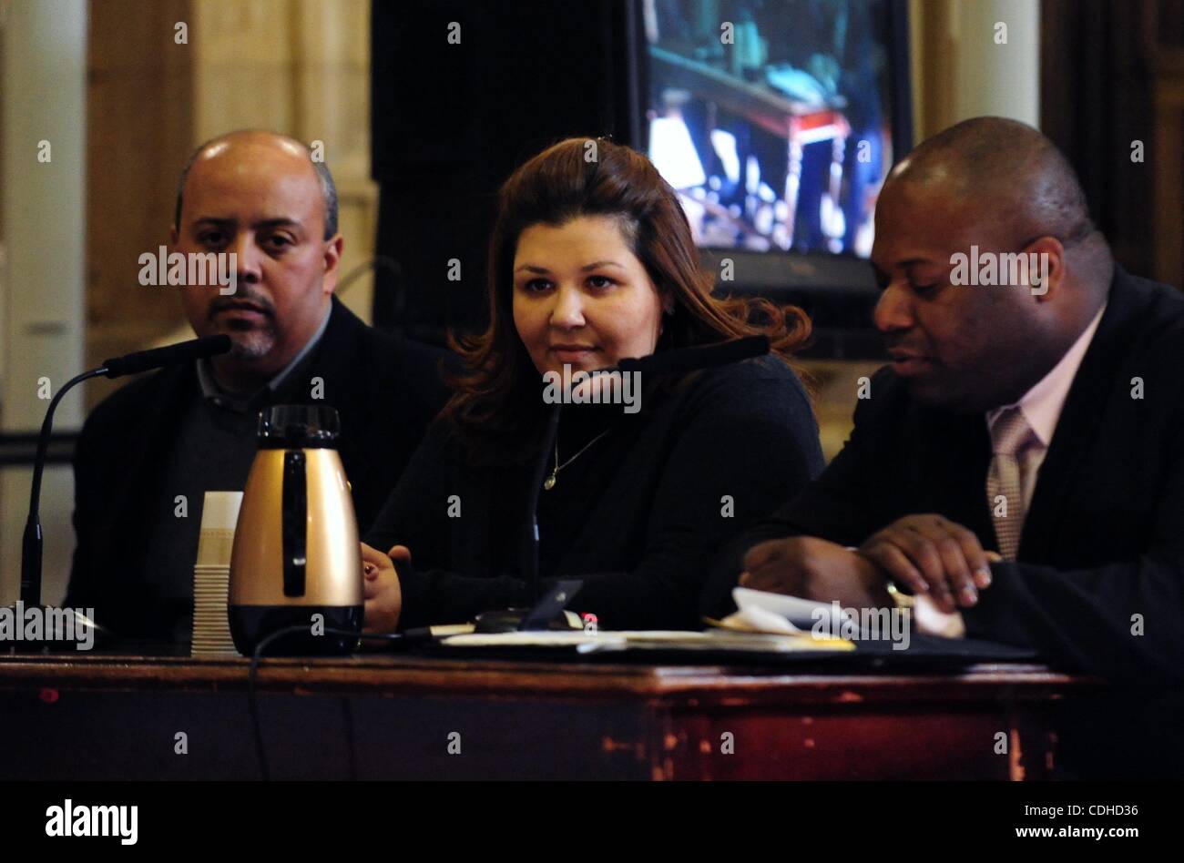 Feb. 3, 2011 - Manhattan, New York, U.S. - Local small business operators Nelson Eusabio (L) of Compare Supermarkets, beverage distributor Marlene Luganes-Bracho (C) and Mark Tannis (R) of Shopper's World testify at the City Council hearing on the proposed New York City Wal-Mart. (Credit Image: © Br Stock Photo