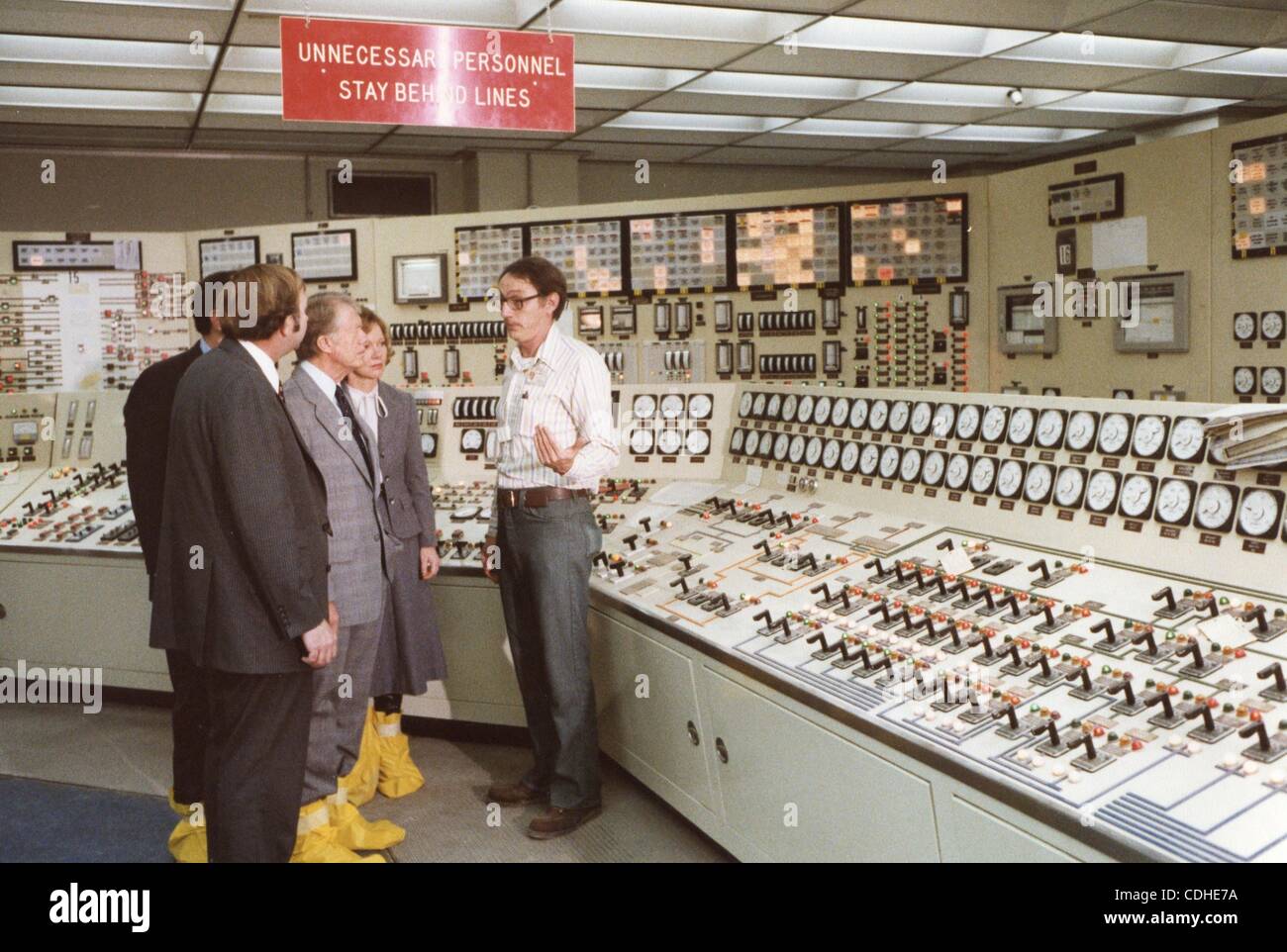 Feb. 4, 2011 - Three Mile Island, PENNSYLVANIA, U.S. - (FILE) A file picture dated 01 April 1979 shows US President Jimmy Carter (C) is seen in the control room while receiving a briefing on the Three Mile Island Nuclear Generating Station accident in Three Mile Island, Pennsylvania, USA. The partia Stock Photo