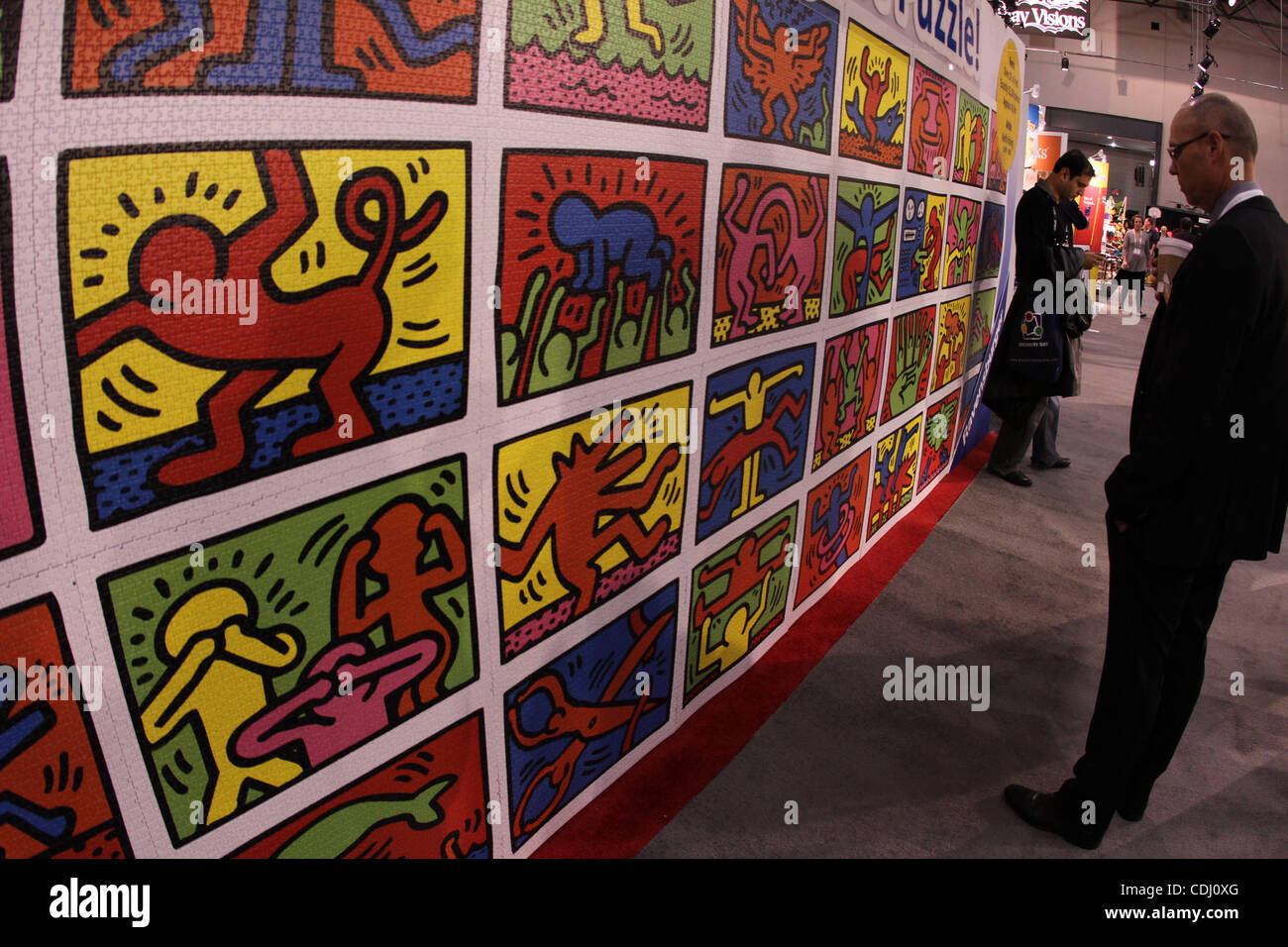 Detail of the World's Largest Puzzle on display. Ravensburger's largest  commercially available puzzle, "Keith Haring: Double Retrospect" on display  at The Toy Fair which opens at Javits Convention Center; 655 W. 34th