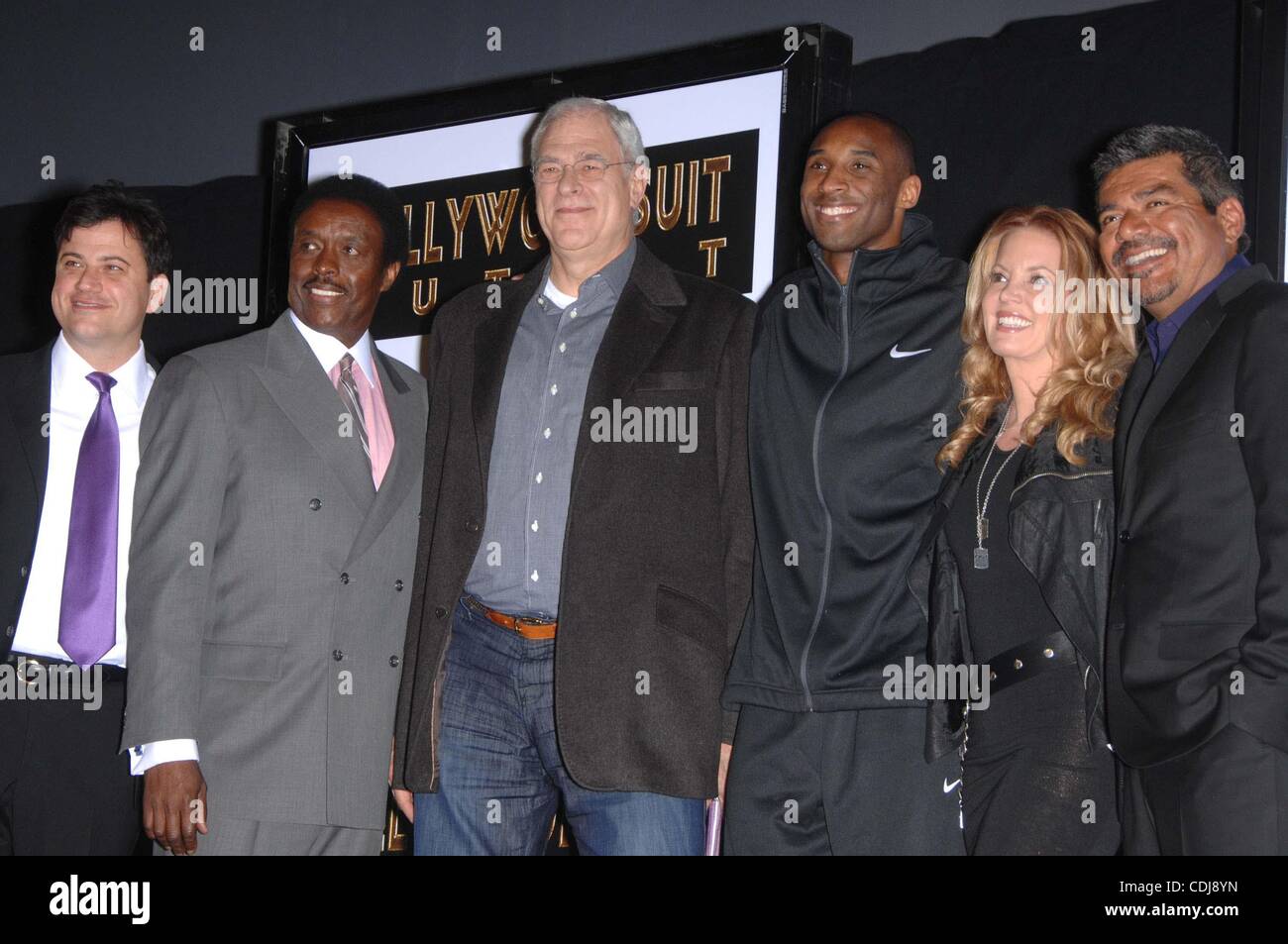Feb. 19, 2011 - Hollywood, California, U.S. - Jimmy Kimmel, Jim Hill, Phil Jackson, Jeanie Buss and George Lopez during a ceremony honoring Kobe Bryant with a Hand and Footprint Ceremony at Grauman's Chinese Theatre, on February 19, 2011, in Los Angeles.. 2011..K67658MGE(Credit Image: Â© Michael Ger Stock Photo
