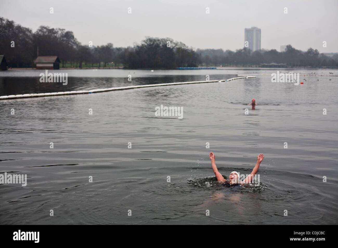 Feb 23, 2011 - London, England, United Kingdom - Annie has been swimming in wintery waters for eleven years. Rain or shine, winter or summer, Serpentine Swimming Club members gather at the Serpentine Lido in Hyde Park all year long. The Serpentine Swimming Club is one of the oldest swimming clubs in Stock Photo