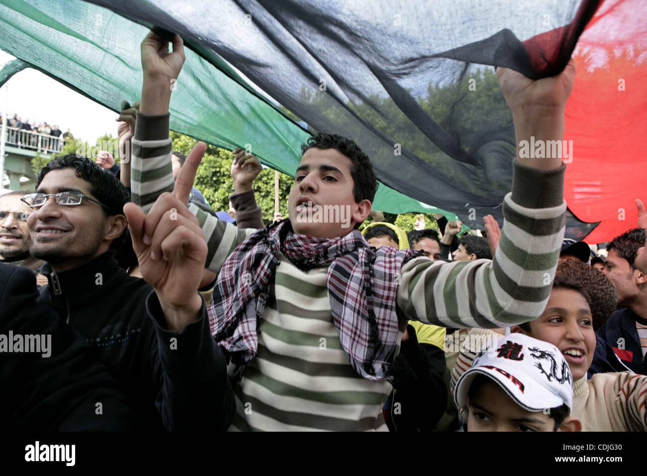 Libyan protesters demonstrate against Libyan leader Moammar Gadhafi during a rally at the Court Square in Derna, Libya, on Feb. 25, 2011. Photo by Karam Nasser Stock Photo