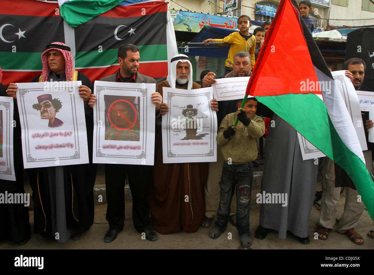 Palestinians take part in a protest to show solidarity with Libyan people, in Gaza city. Photo by Ashraf Amra Stock Photo