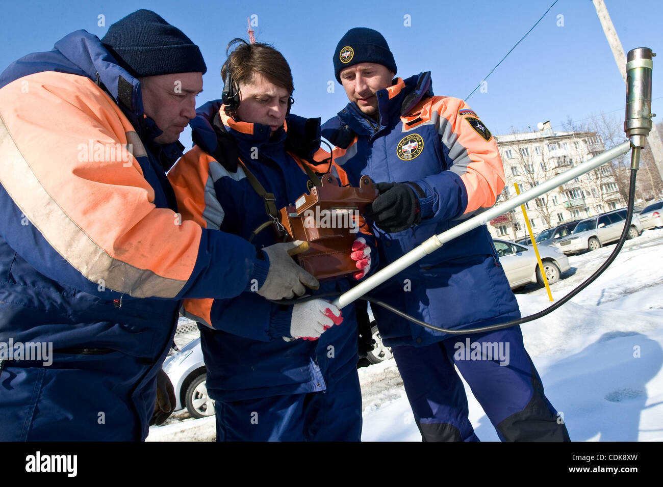 Russia. Radiation control in Yuzhno-Sakhalinsk city of Sakhalin Island caused by Fukushima Nuclear Power Plant explosion in Japan.Pictured: Russian Emergency forces personnel measuring radiation contamination level in Yuzhno-Sakhalinsk city - the closest russian territory to Japan. Stock Photo