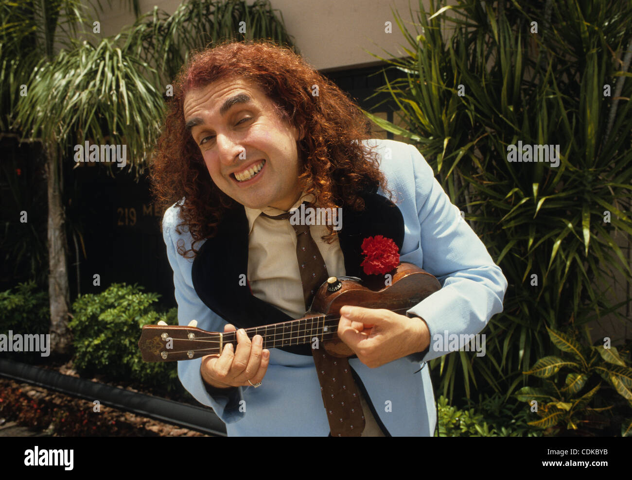 Mar. 15, 2011 - Atlanta, GA, USA - Herbert Khaury (April 12, 1932 â€“ November 30, 1996), better known by the stage name Tiny Tim, was an American singer and ukulele player. He was most famous for his rendition of ''Tiptoe Through the Tulips'' sung in a distinctive high falsetto/vibrato voice (thoug Stock Photo