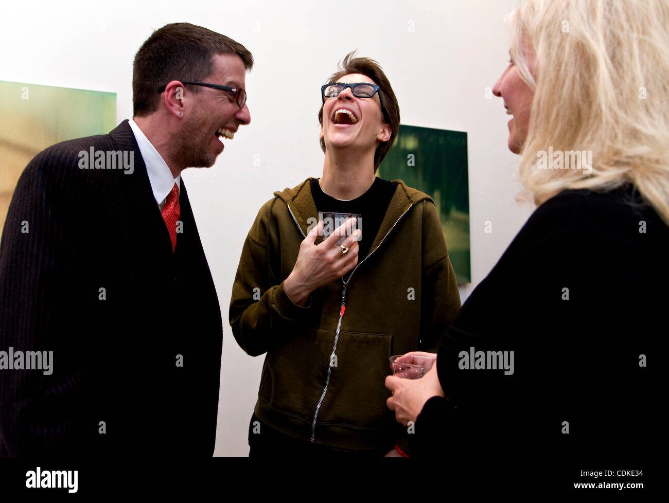 Mar.17, 2011 - San Francisco, California, USA - MICHAEL KUSEK, RACHEL MADDOW and her partner SUSAN MIKULA at the opening reception for Ms. Mikula's 'American Vale' series of Polaroid photographs at the George Lawson Gallery. Stock Photo