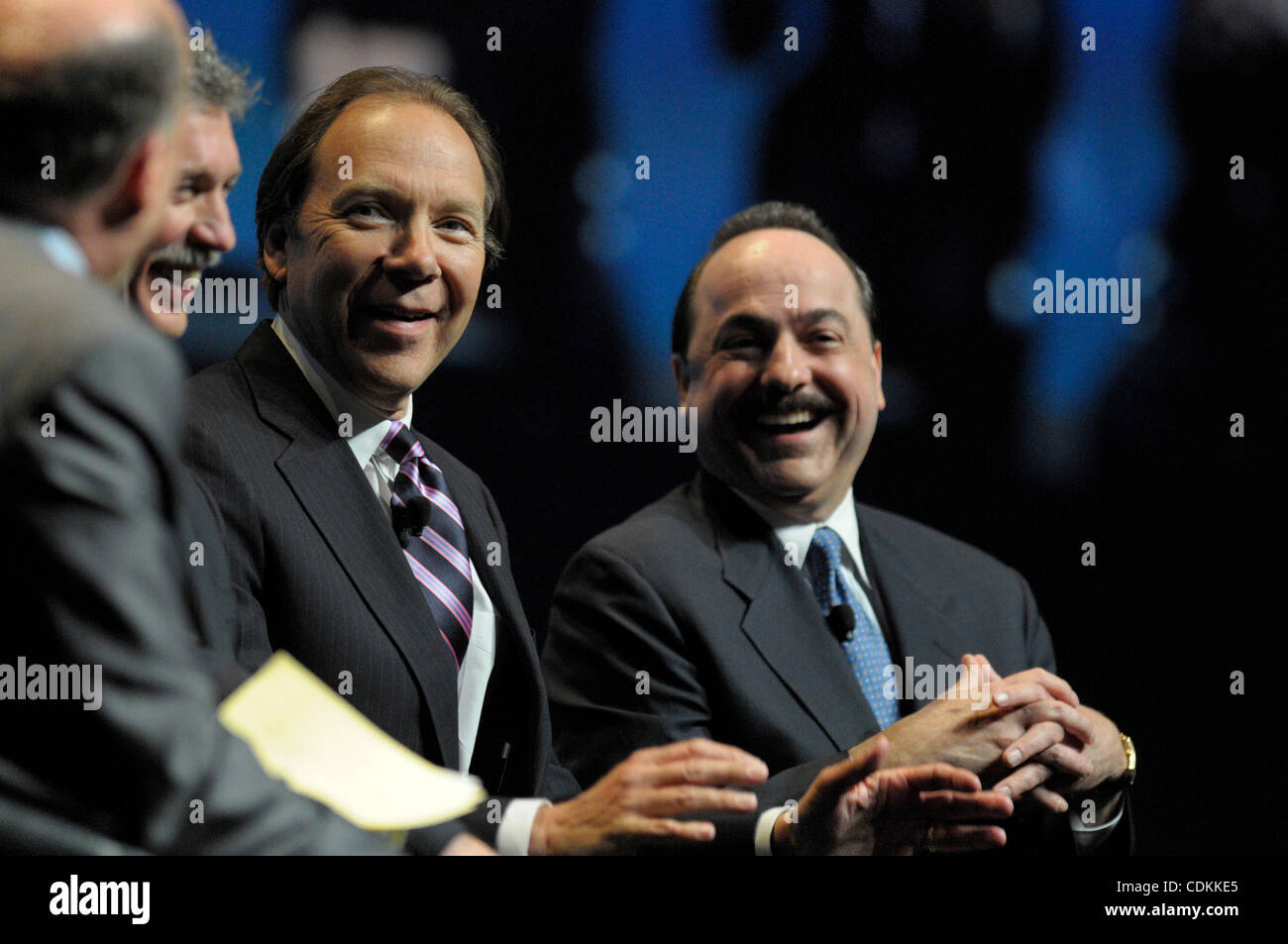 March 22, 2011 - Orlando, Florida, U.S. - Television commentator JAMES CRAMER, left, moderates a panel discussion about the wireless industry with DAN MEAD, second from left, chief executive officer of Verizon Wireless, DAN HESSE, chief executive officer of Sprint Nextel, and RALPH DE LA VEGA, chief Stock Photo