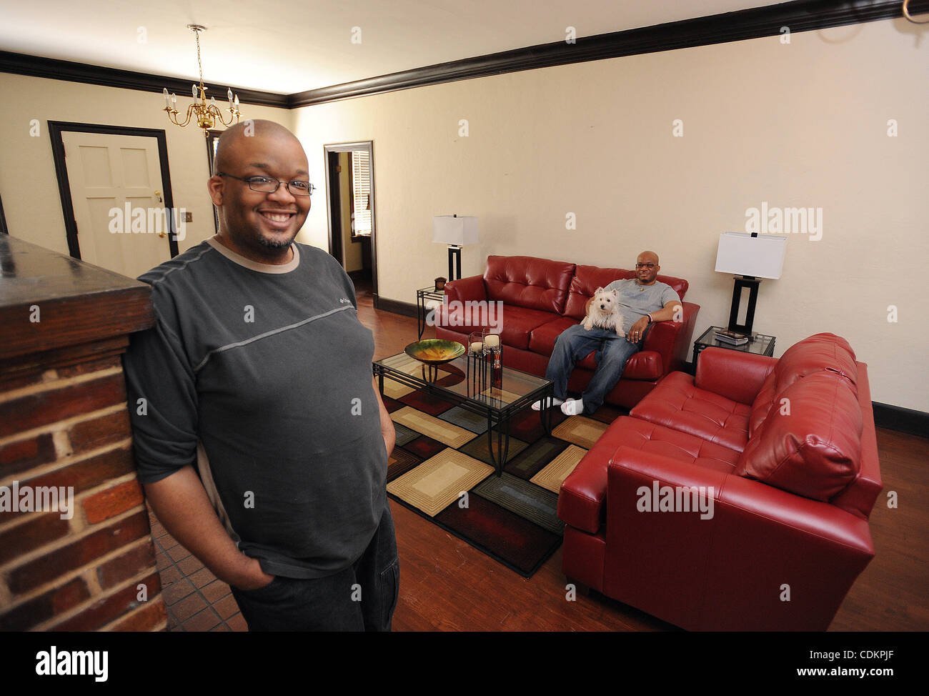 Mar. 24, 2011 East Point, GA, U.S. EAST POINT, GA MARCH 24 Tuan N'Gai, 39, (L).and his