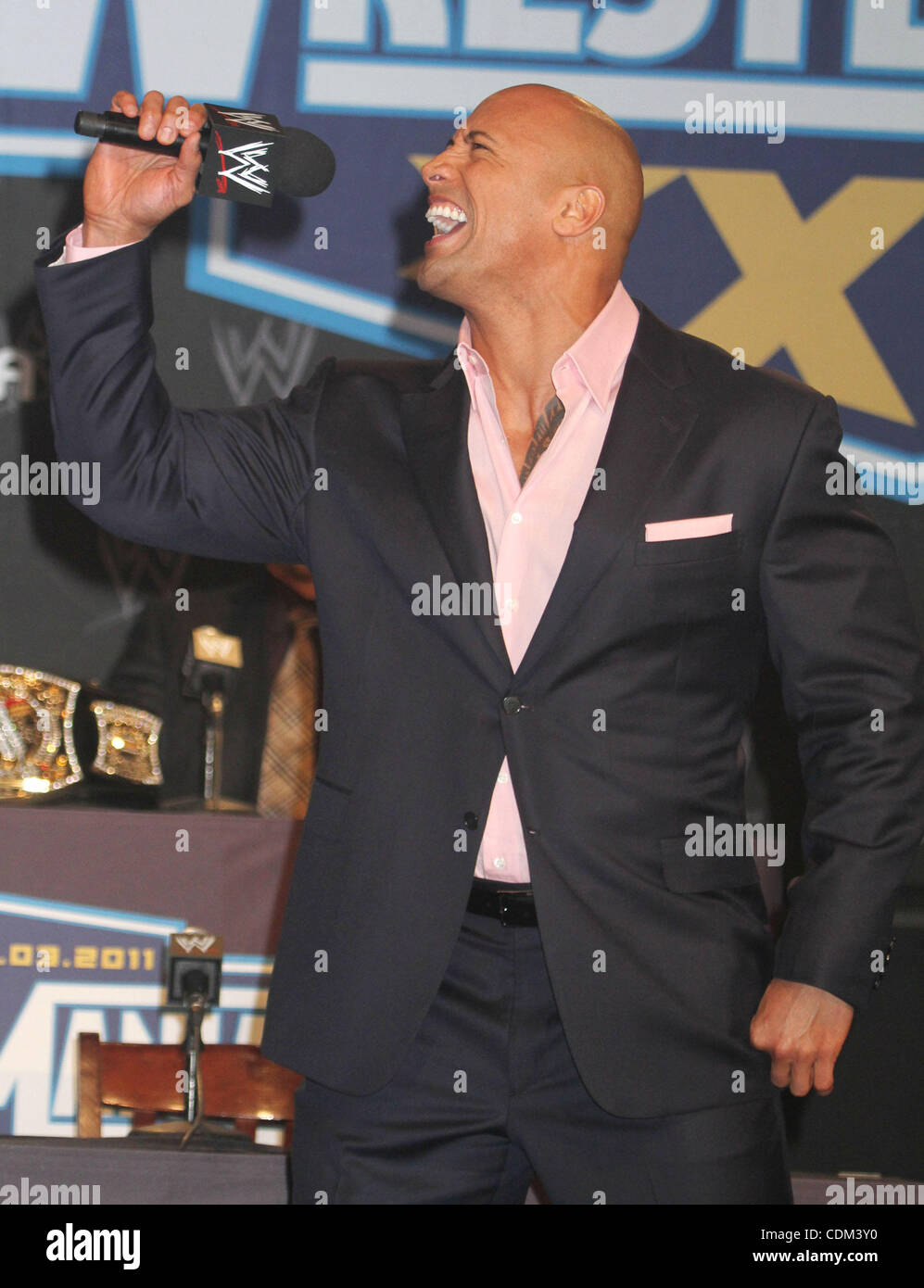 Dwayne The Rock Johnson, John Cena in attendance for WRESTLEMANIA XXVII  Press Conference, Hard Rock Cafe, New York, NY March 30, 2011. Photo By:  Rob Rich/Everett Collection Stock Photo - Alamy