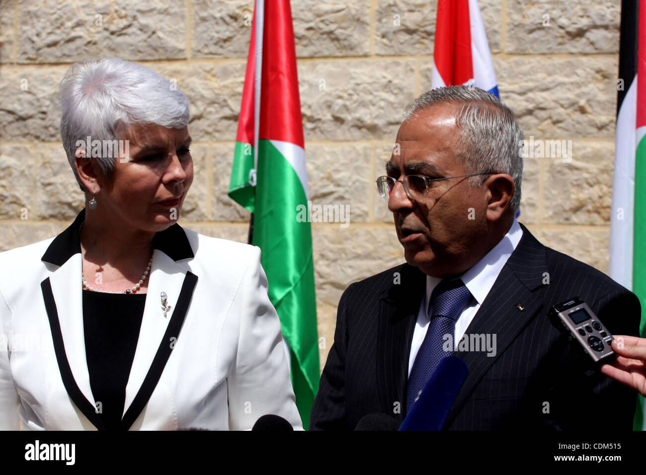 Palestinian Prime Minister Salam Fayyad and  his Croatian counterpart Jadranka Kosor attend a joint press conference after their meeting in the West Bank city of Ramallah, on March 31, 2011. Photo by Issam Rimawi Stock Photo