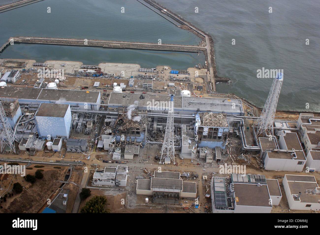 Mar. 31, 2011 - Okuma, Japan - In this handout picture dated March 20 2011 taken by Air Photo Service's unmanned aircraft Fukushima Daiichi nuclear plant of Tokyo Electric Power Company (TEPCO) is pictured. TEPCO announced that 10,000 times the amount of iodine full-limit for water is found from the Stock Photo