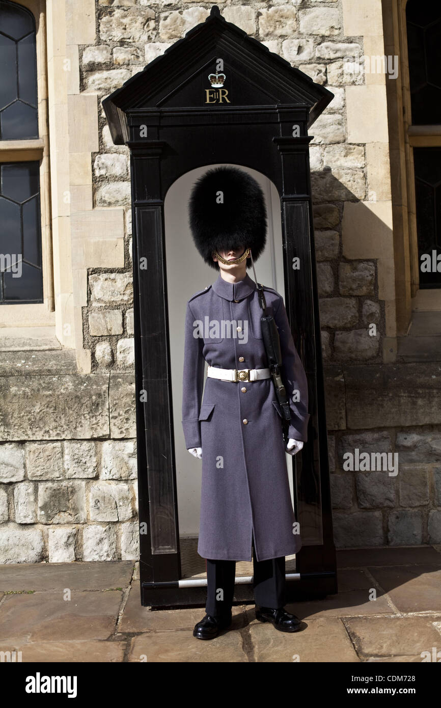 Apr. 01, 2011 - London, England, United Kingdom - ''Beefeater'' guard.Her Majesty's Royal Palace and Fortress, more commonly known as the Tower of London, is a historic castle on the north bank of the River Thames in central London, England. It was founded in 1066 as part of the Norman Conquest of E Stock Photo