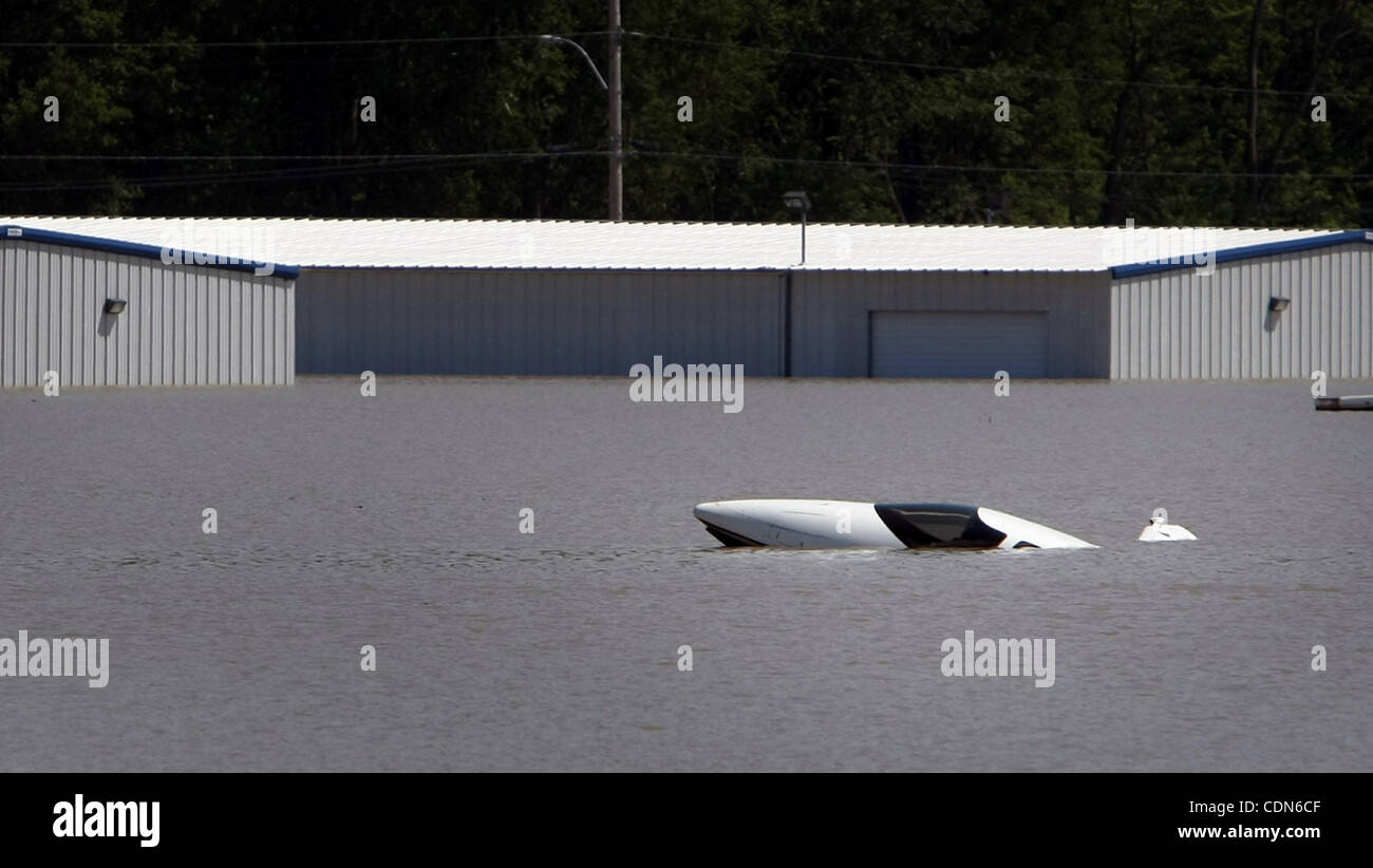 May 5, 2011 - Memphis, Tennessee, U.S. - A swamped glider pokes it's nose out of flood water at the DeWitt Spain Airport after one of the expanded levees constructed around the airport was breached, flooding the small airstrip north of downtown Memphis. (Credit Image: © Jim Weber/The Commercial Appe Stock Photo