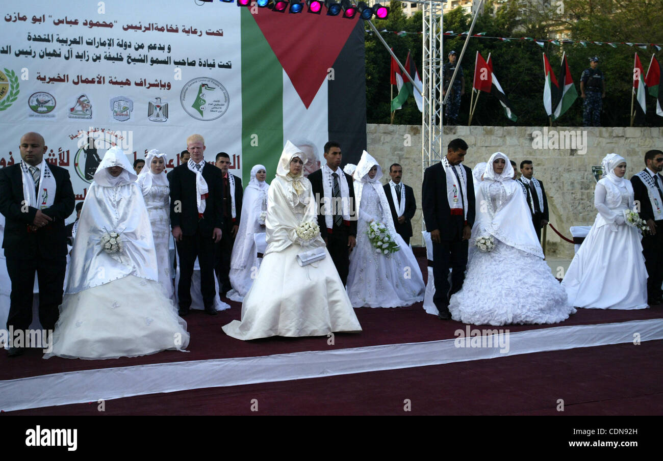 Palestinian Brides And Grooms Take Part In A Mass Wedding Ceremony