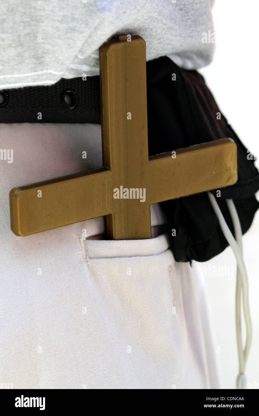 May 21, 2011 Los Angeles, California, U.S An attendee with a crucifix in his back pocket at
