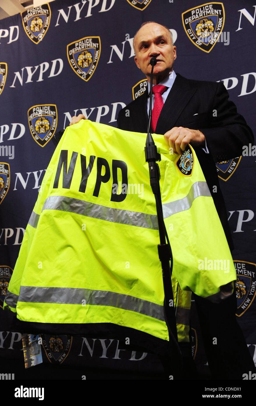 May 27, 2011 - Manhattan, New York, U.S. - Police Commissioner RAYMOND  KELLY shows off the new NYPD rain jacket. City of New York Police  Department Promotion Ceremony, One Police Plaza. (Credit