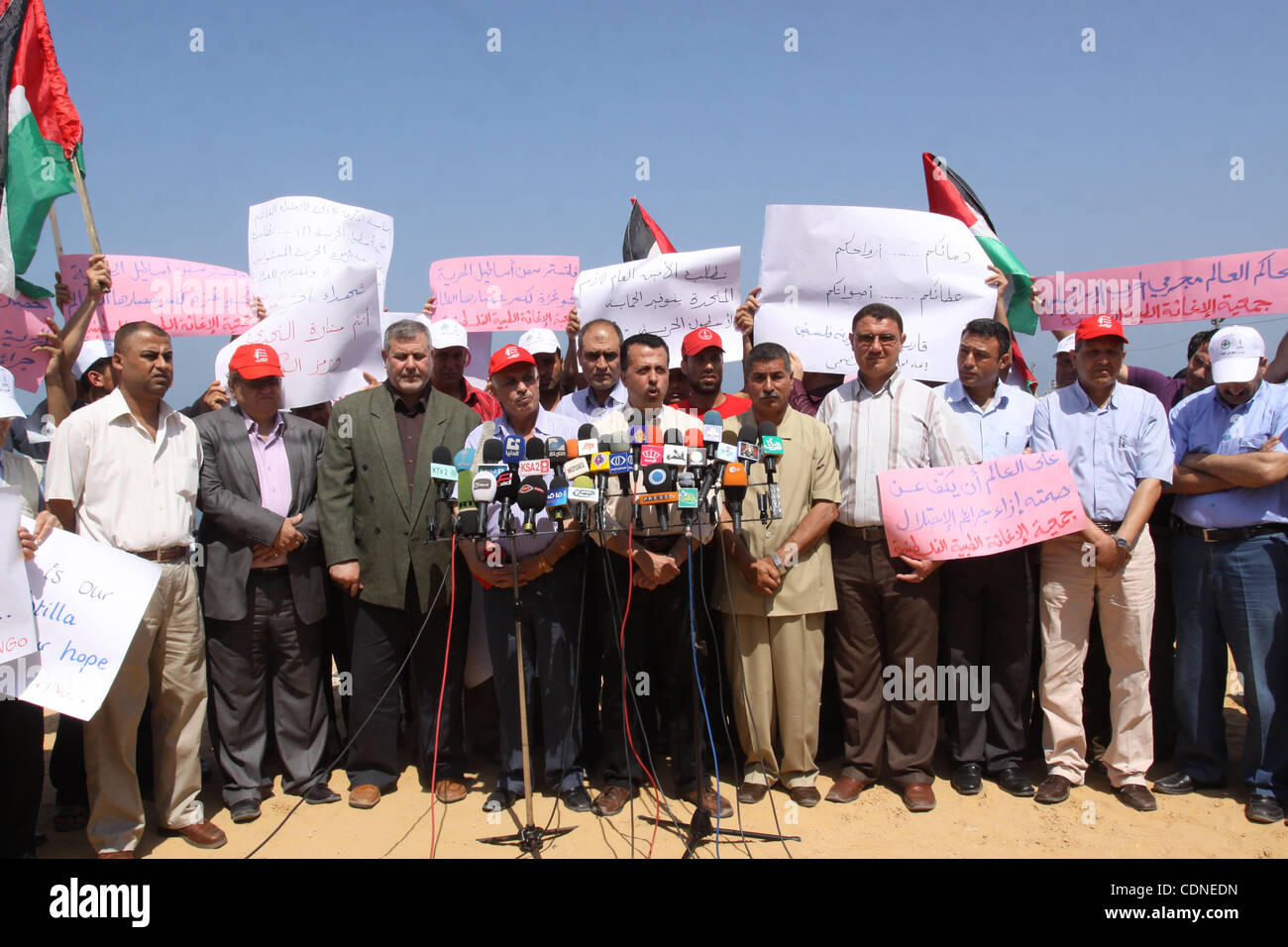 May 30, 2011 - Ramallah, West Bank - NGO Network give a speech during a press conference at a rally marking the first anniversary of the death of nine Turks, who were shot dead last May when Israeli naval commandos seized a Turkish ship that was part of a flotilla trying to break the Gaza blockade.  Stock Photo