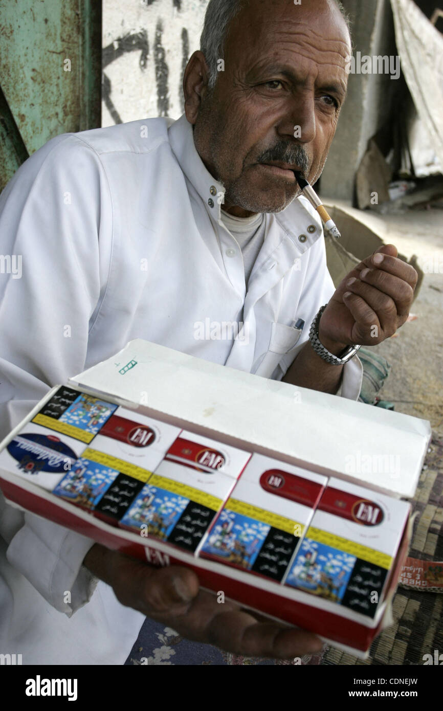 cigarettes gaza Palestinian man holds a cigarettes in a shop in Rafah, southern Gaza Strip  on May 31, 2011. during the World No Tobacco Day, Middle East of some 240  million people soared 47