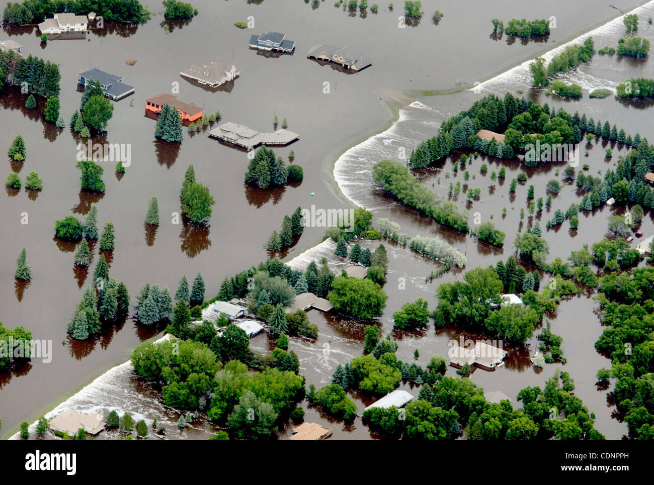 June 26, 2011 Minot, North Dakota, U.S. Flood waters pour into