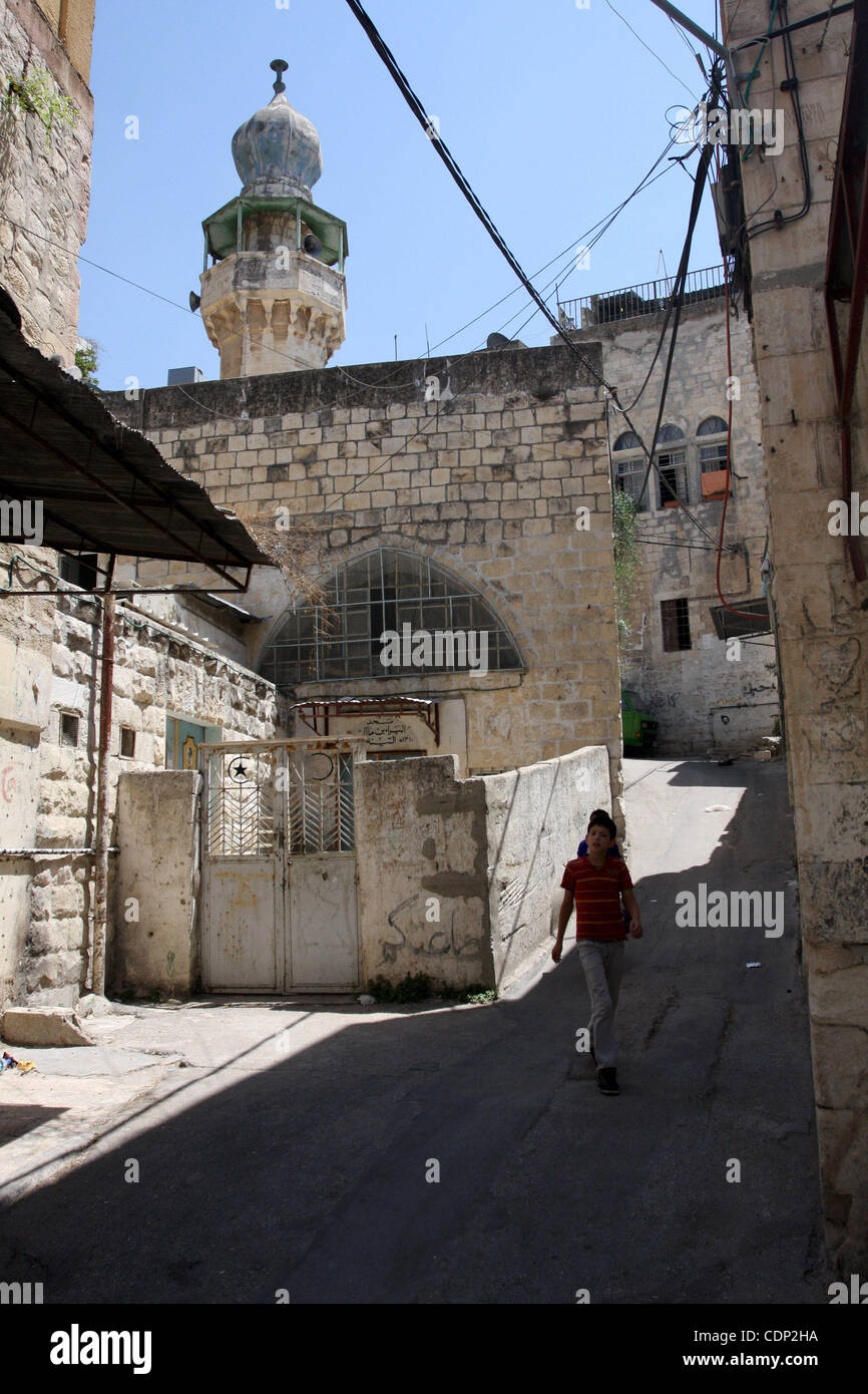 A Palestinian boy walks in the Old City of Nablus in the West Bank on ...
