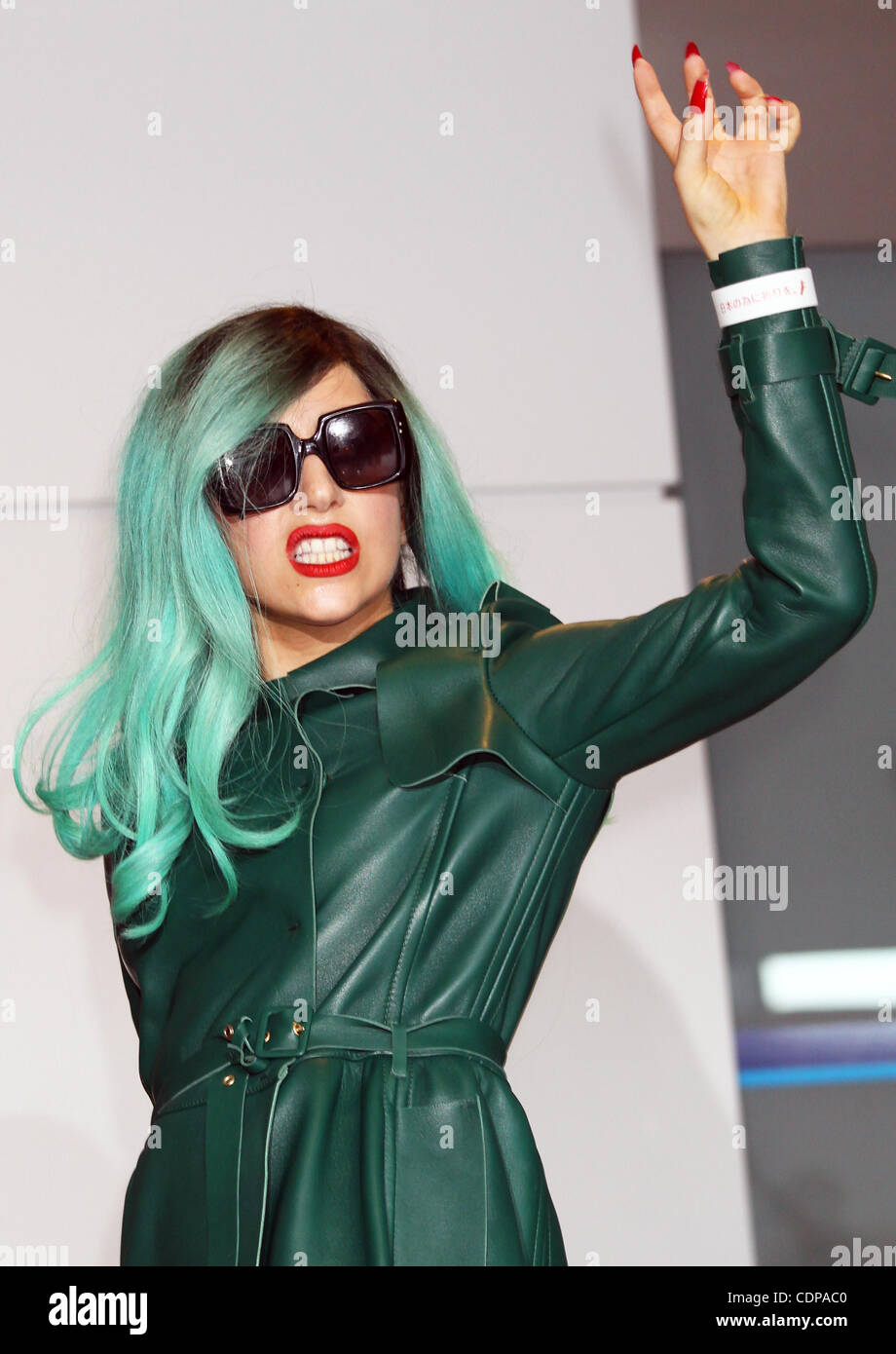 June 21, 2011 - Narita, Japan - Singer LADY GAGA gestures as she