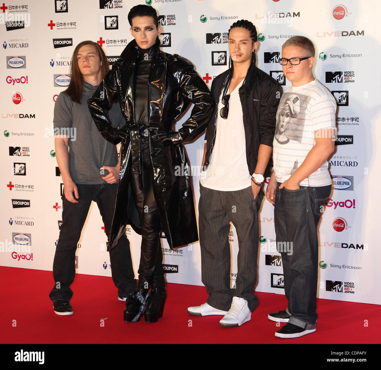 june-25-2011-narita-japan-tokio-hotel-pose-on-the-red-carpet