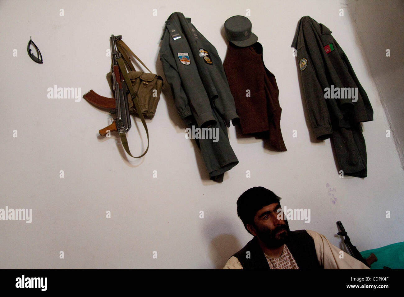Apr 25, 2011 - Naw Zad, Helmand, Afghanistan - Naw Zad district Afghan National Police Chief ABDULLAH FARIDI, from the village of Surkano in the area sits in his office during a meeting with correspondents and U.S. Marines at the police headquarters in the town of Naw Zad in the Naw Zad district of Stock Photo