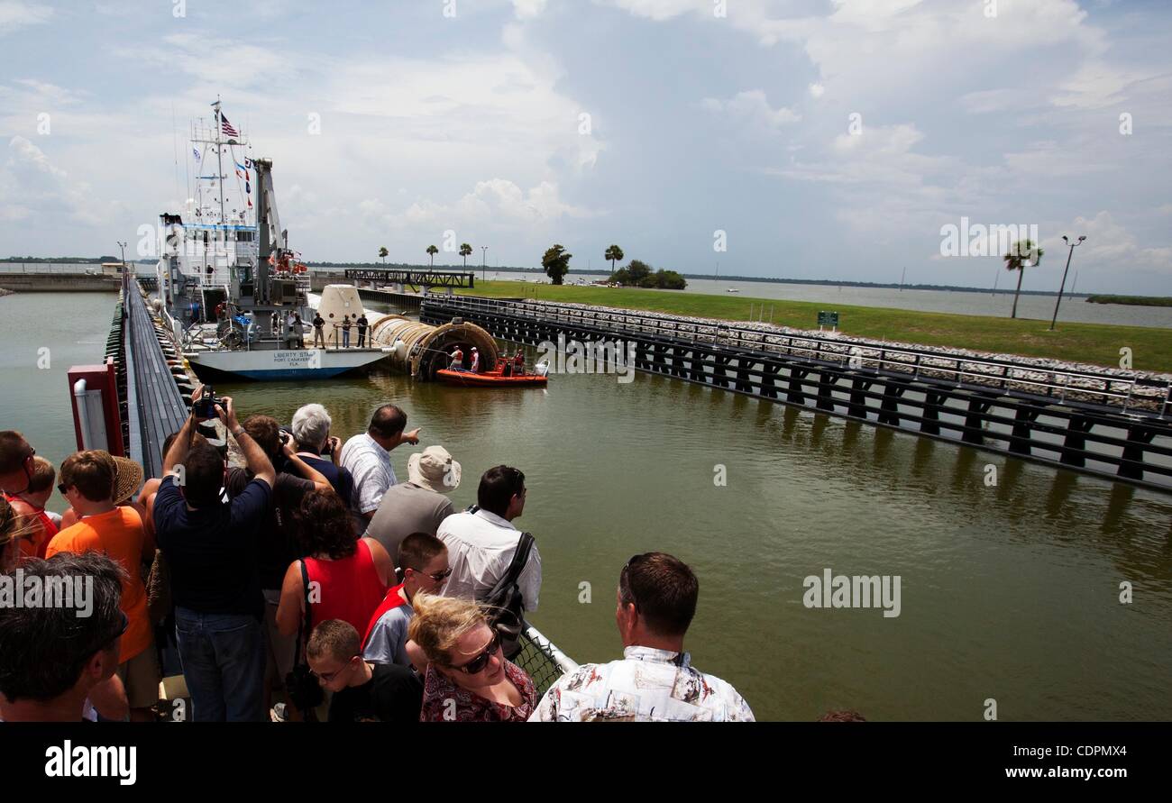 Jul 10, 2011 - Cape Canaveral, Florida, U.S. - MV Liberty Star sits in Canaveral Lock with the first of space shuttle Atlantis's two solid rocket boosters as onlookers take pictures (Credit Image: © Joel Kowsky/ZUMApress.com) Stock Photo
