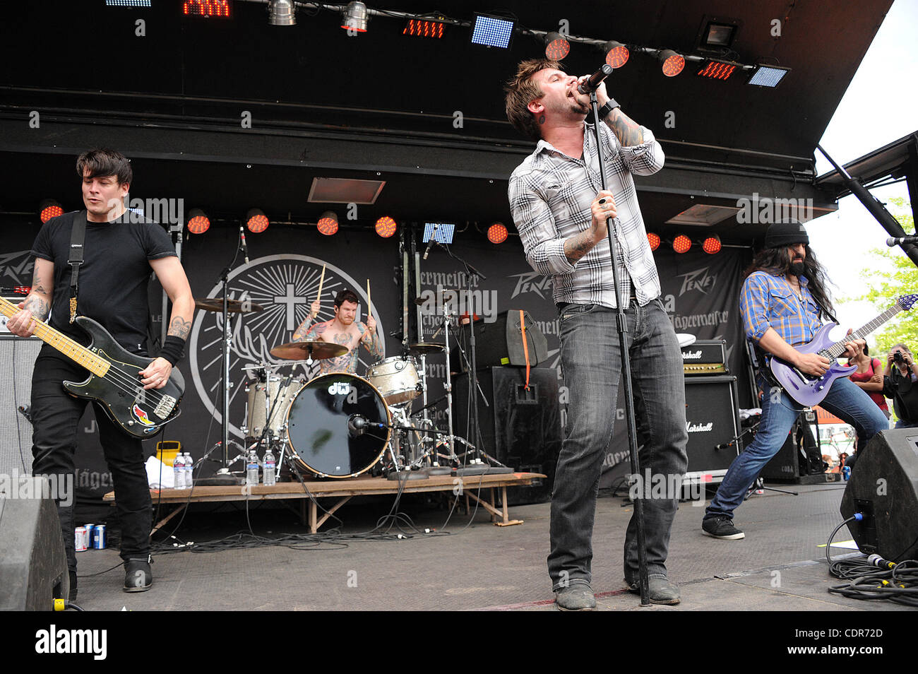 May. 22, 2011 - Columbus, Ohio; USA - (L-R) Bass Guitarist JOSH NEWTON, Drummer ANDY HURLEY,  Singer KEITH BUCKLEY and Guitarist ROB CAGGIANO of the band The Damned Things performs live as part of the 5th Annual Rock on the Range Music Festival that is taking place at the Crew Stadium located in Col Stock Photo