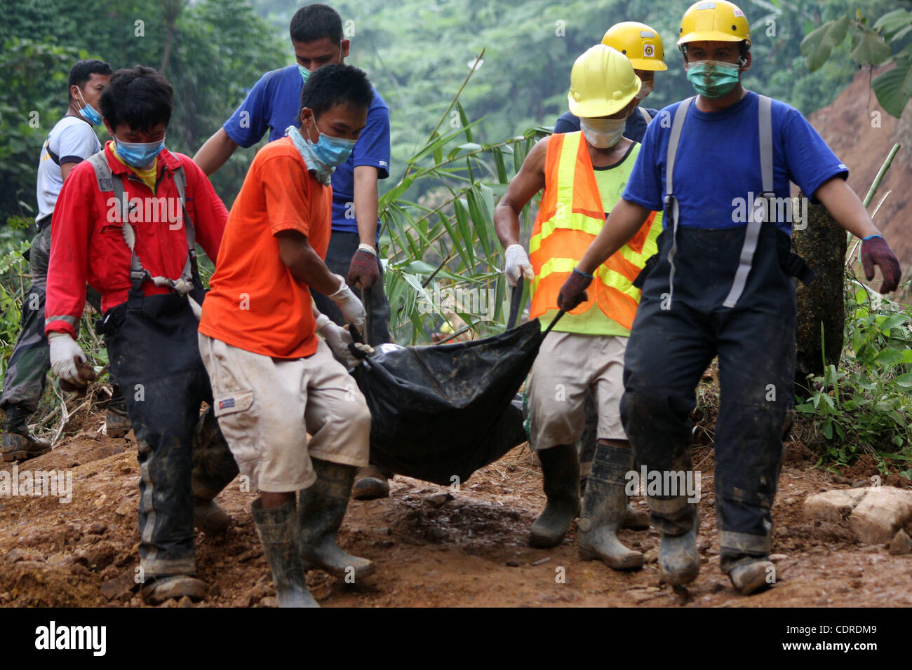 Philippine Rescuer Model Apr 25, 2011 - Kingking, Compostella, Philippine - Rescuers carry a ...