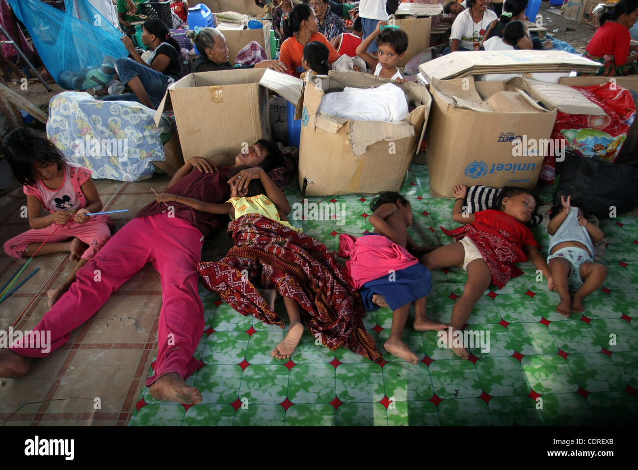 June 20, 2011 - Cotabato, Philippines - Filipino residents displaced by widespread flash floods at the evacuation center in the southern city of Cotabato in the southern Philippines. More than a half million people were displaced by the floods. The military said Tuesday, flashfloods in the region, c Stock Photo