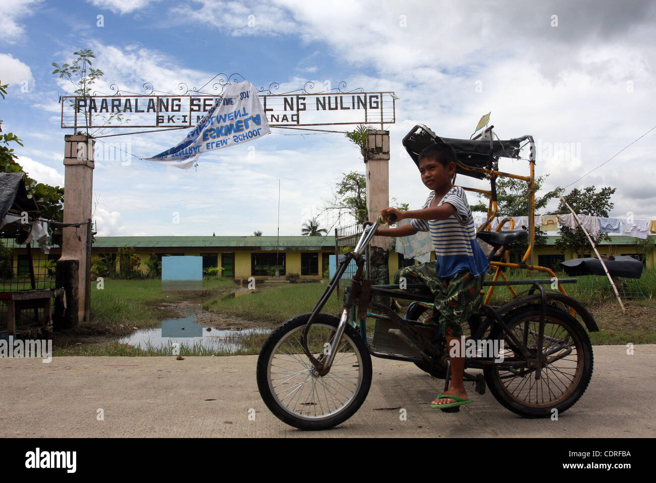 Jul 1, 2011 - Sultan Kudarat, Philippines - A public school remains closed in the southern town of Sultan Kudarat in the southern Philippines, Friday after although flood waters in the region caused by the clogging of tons of water lilies subsided. In  the city of Davao, flash floods on June 29, 201 Stock Photo