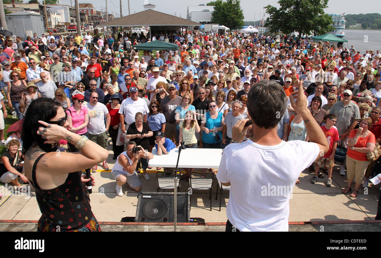 Danielle Colby Cushman, left and Mike Wolfe, two of the three stars on The History Channel's 'American Pickers,' answer questions from the audience Saturday June 4, 2011 during the 'American Pickers' Weekend that brought an estimated 10,000 people to LeClaire, Iowa. Co-star Frank Fritz did not atten Stock Photo