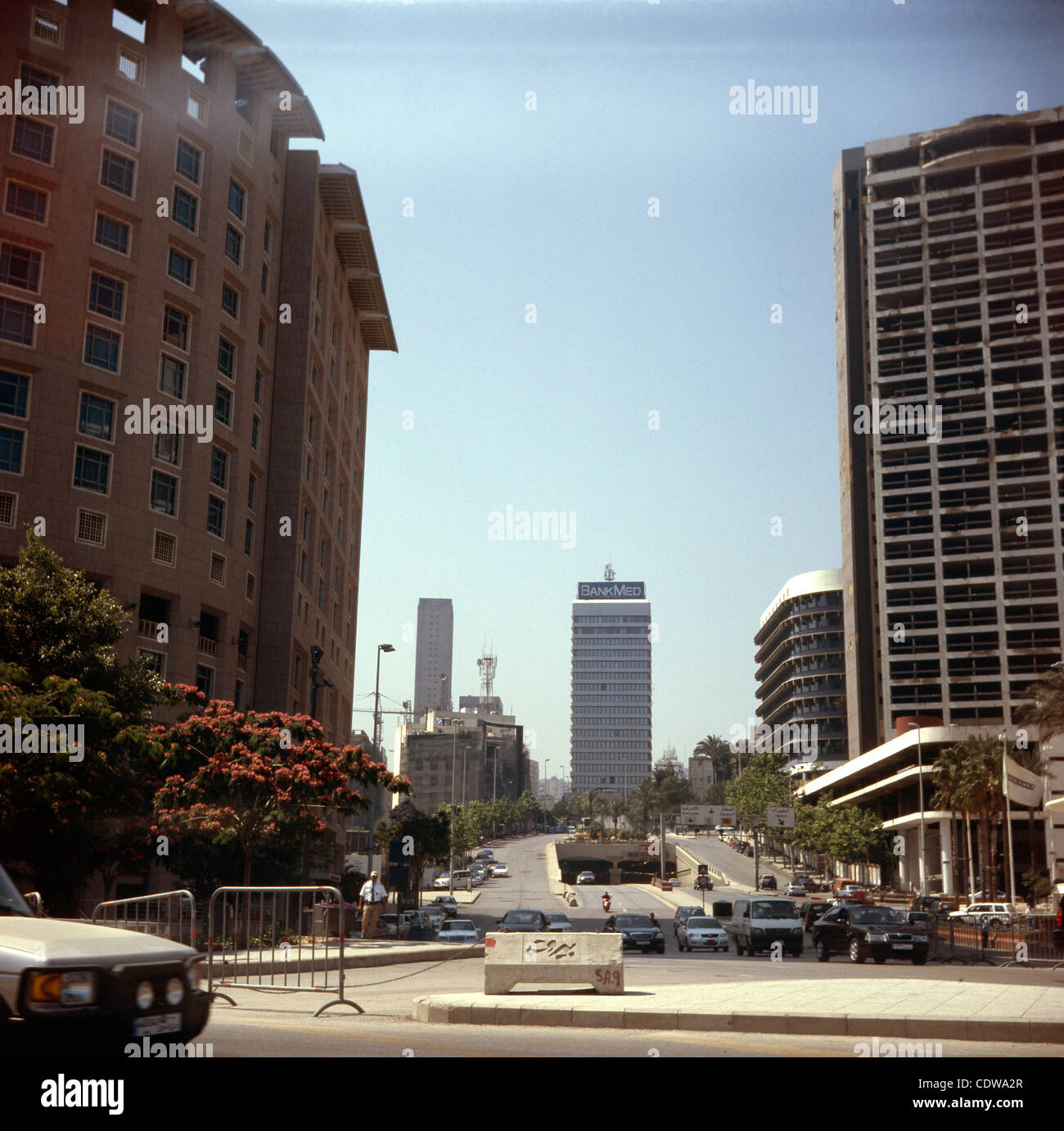 June 17, 2011 - Beirut, Lebanon - Still standing - the towering Holiday Inn, the scene of a famous battle in 1975 (on the right), downtown Beirut, Lebanon. Morphogenesis of the Green Line / Lebanese Civil War 1975-1991.'' In Beirut the destruction took twenty one years, sixteen years of war plus fiv Stock Photo