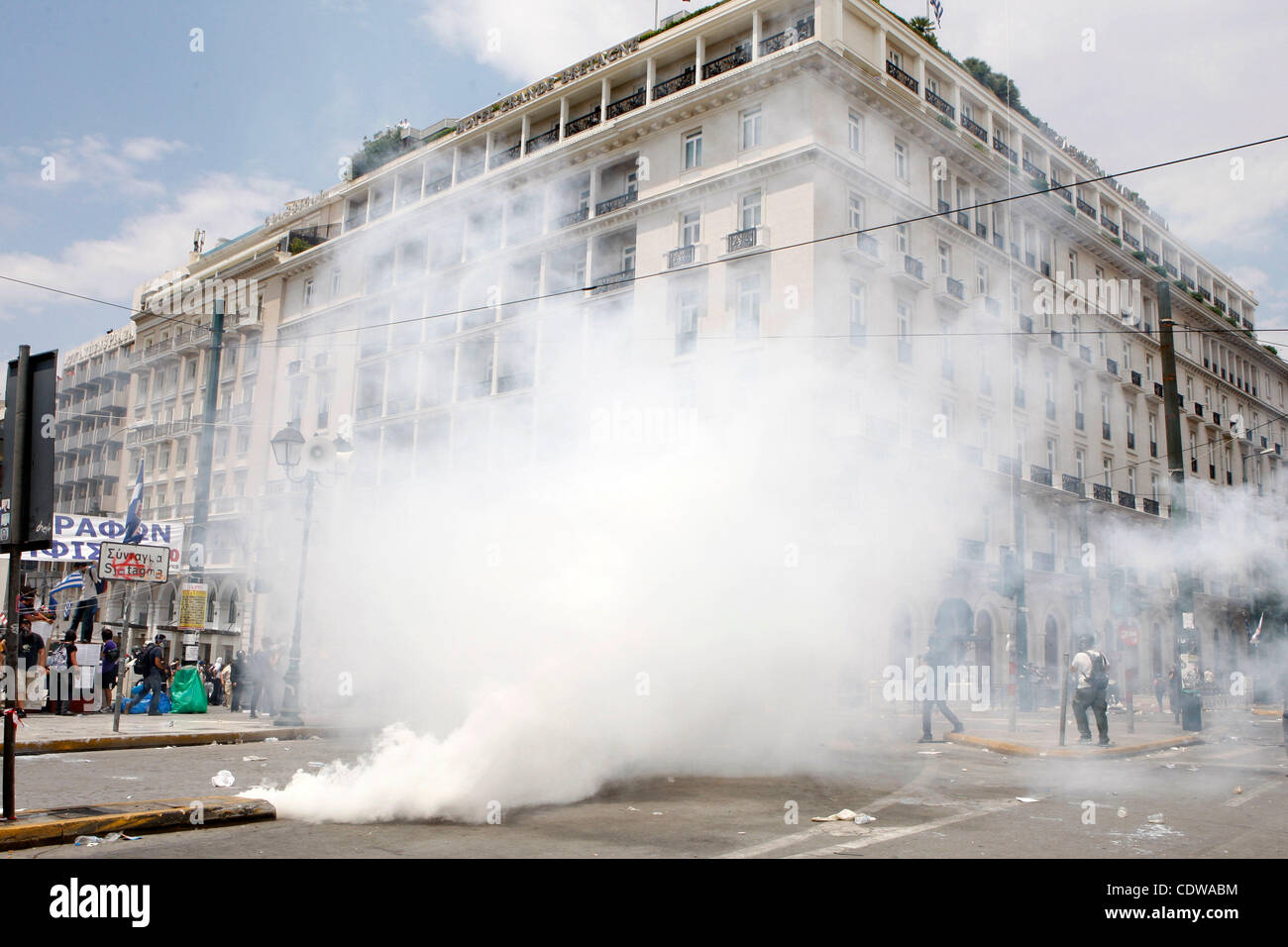 June 29, 2011 - Athens, Greece - Hotel Grande Bretagne. Greek police firing tear gas fought running battles with stone-throwing protesters outside parliament as signs grew the government would succeed in pushing through an austerity plan demanded by creditors. (Credit Image: © Aristidis Vafeiadakis/ Stock Photo