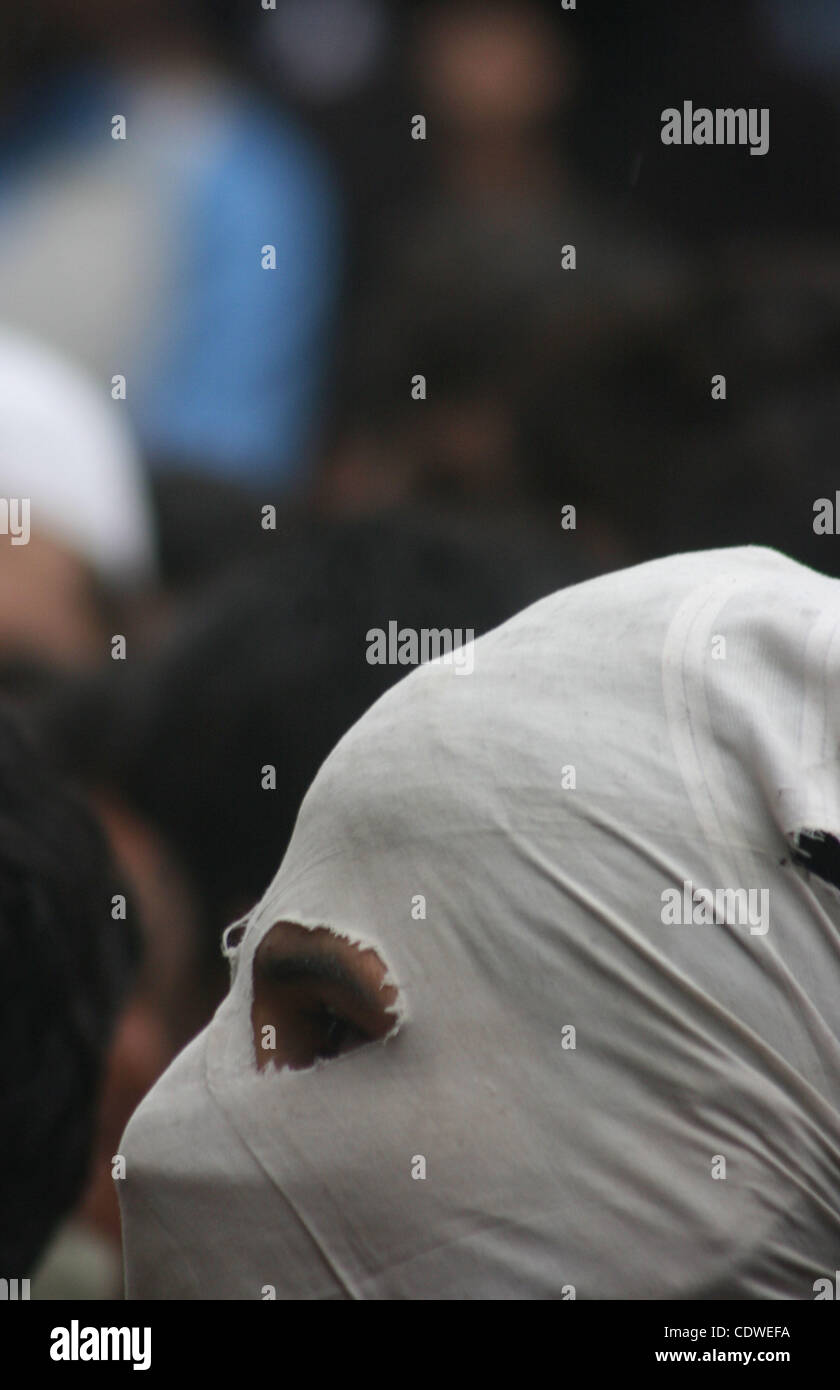 May 06, 2011 - Srinagar, Kashmir, India - Kashmiri muslims take part during funeral prayers for Osama bin Laden  in Srinagar, the summer capital of Indian Kashmir. This is the first Friday prayers after bin Laden was killed early May 2 in a U.S. special forces assault on a Pakistani compound, then q Stock Photo