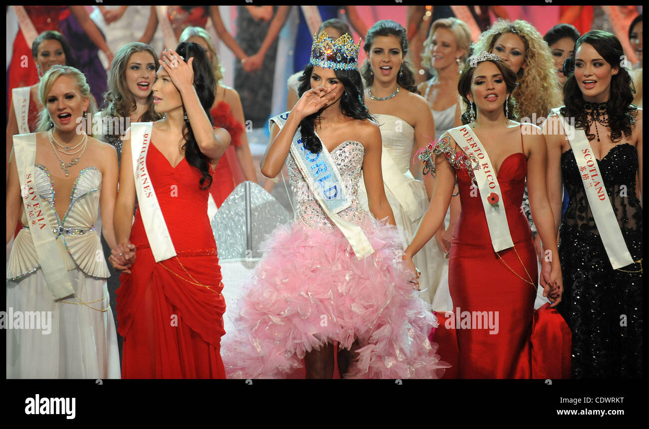 Nov. 6, 2011 - London, United Kingdom - Miss Venezuela Ivian Lunasol Sarcos Colmenares wins  the 2011 Miss World final at Earls Court London, with Gwendoline Ruais from the Philippines (left, red dress) and 3rd place Amanda Perez from Puerto Rico (right red dress), Sunday November 6, 2011. Photo By  Stock Photo