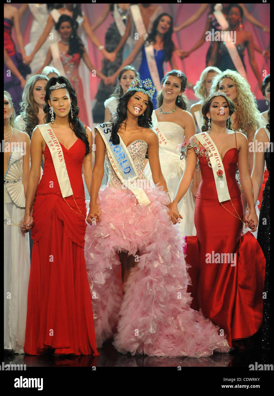 Nov. 6, 2011 - London, United Kingdom - Miss Venezuela Ivian Lunasol Sarcos Colmenares wins  the 2011 Miss World final at Earls Court London, with Gwendoline Ruais from the Philippines (left, red dress) and 3rd place Amanda Perez from Puerto Rico (right red dress), Sunday November 6, 2011. Photo By  Stock Photo
